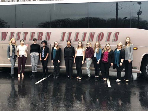 Students in front of bus