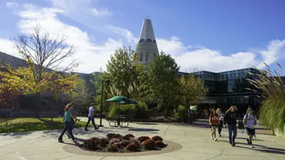 The Cone and University Center with students walking outside