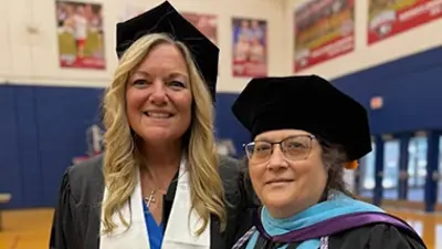 Photo of Nurse faculty with Nursing Student at Commencement