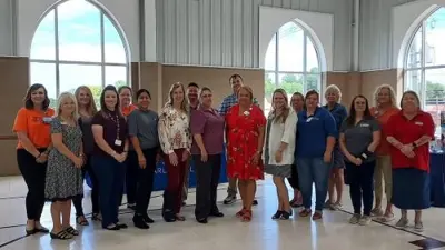 A Group of people representing Dementia Friendly Communities in two rows