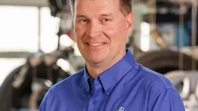 headshot of alumnus Alex Rogier taken at Toyota Motor Manufacturing