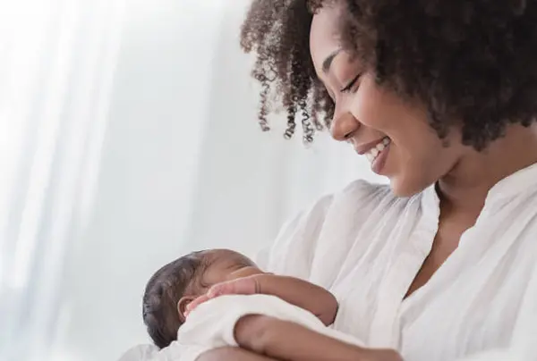 Mother holding an infant