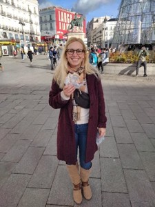 Meggie on a busy sidewalk