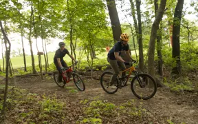 Members of the Evansville community enjoy the many mountain bike trails on campus.