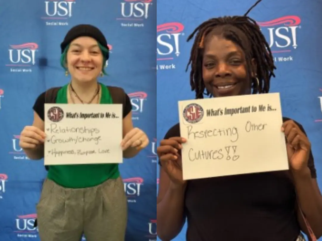 Student participants in a Center for Social Justice Education event hold up written signs answering "What's important to me is..."