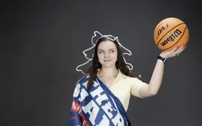 A member of the homecoming court is decked out like the Statue of Liberty for one of her homecoming photos. 