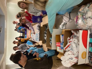 Students stuffing bags