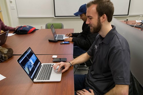 Zack on his laptop