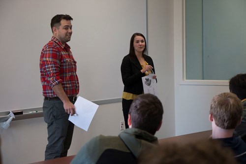 USI graduates Adam Franke, global technology engineer at AstraZeneca, and Courtney Mickel, community engagement director for Community One. The former case team members taught Jeanette Maier-Lytle's UNIV 101 students about analyzing a business case study, giving them a foundation upon which to build in their other business courses.