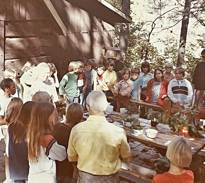A 1972 photo showing elementary school children learning about nature at the Westwood Lodge. 