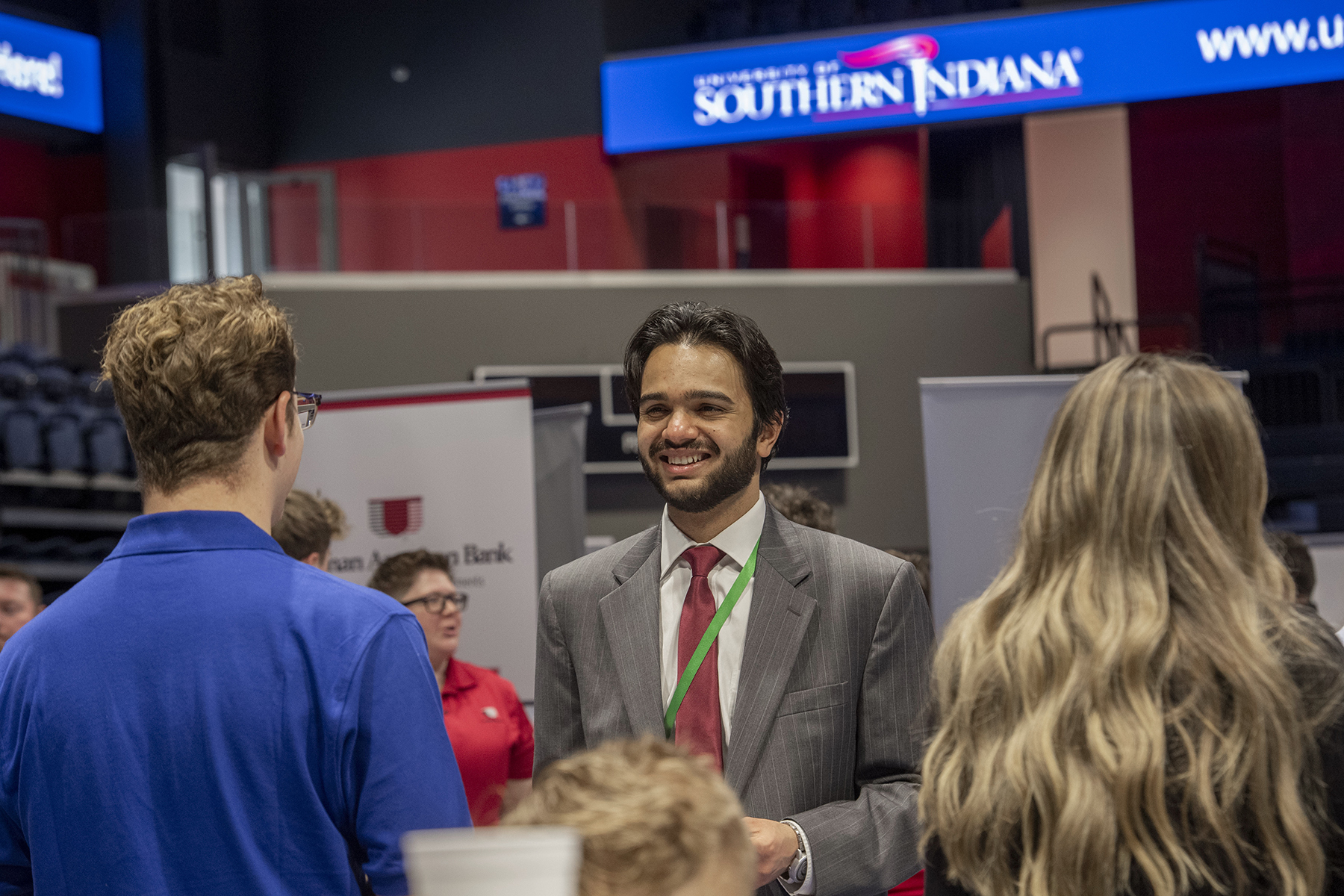 A computer science major talks with a recruiter at one of two USI Career Fairs. 