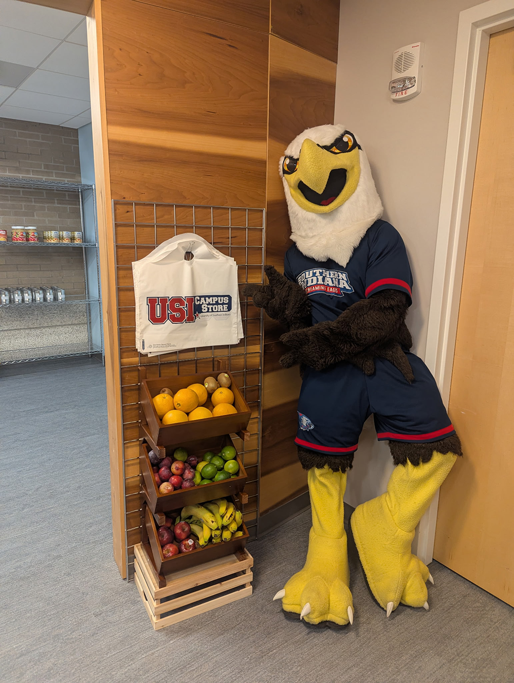 Archie Eagle standing inside the door of food pantry