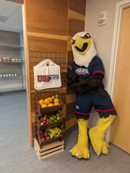 Archie Eagle standing inside the door of food pantry