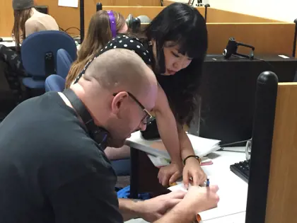 Language Tutor helping Student