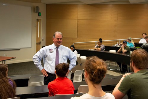 Carroll talking to students