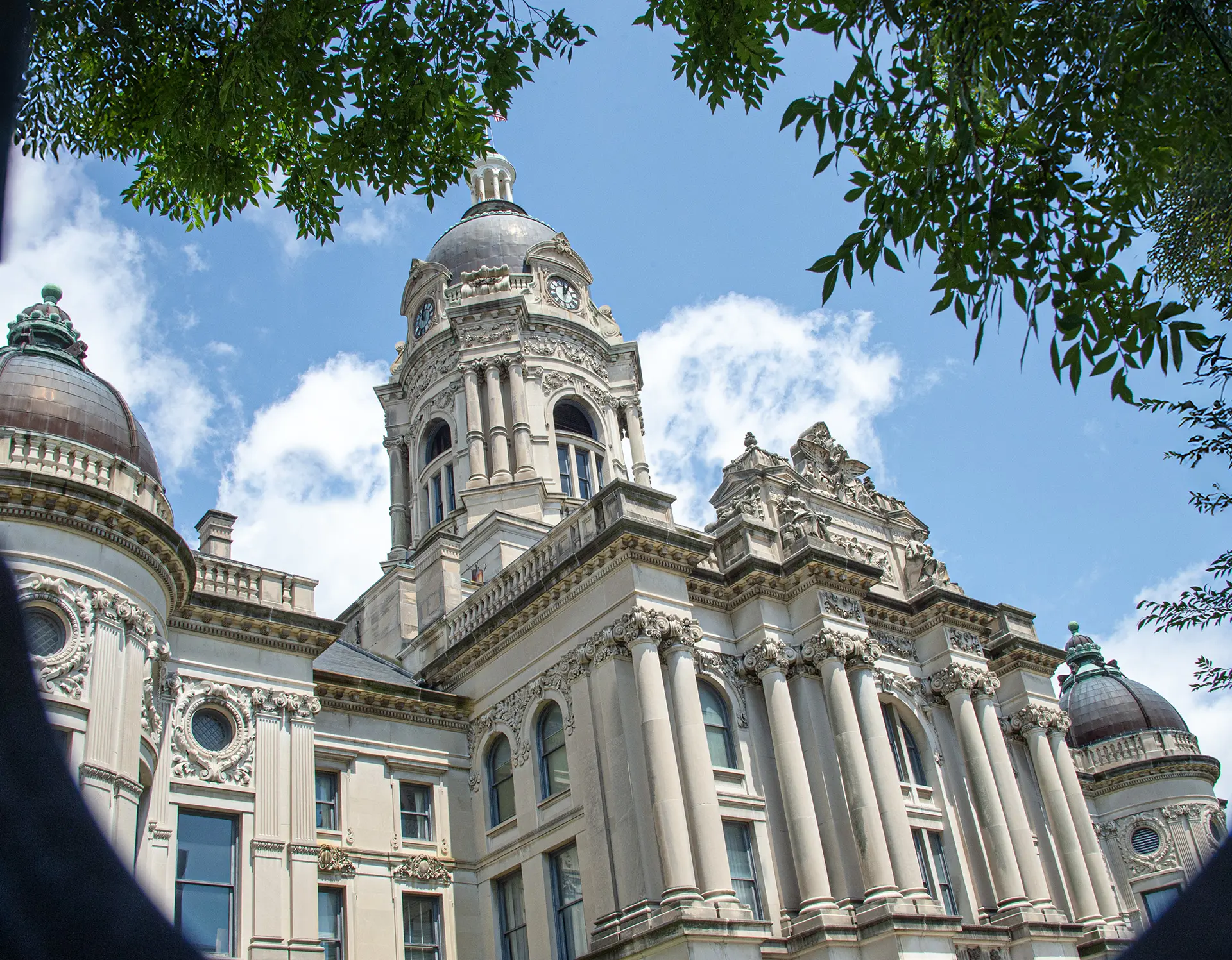 Ground-level view of the Old Courthouse exterior architecture on a sunny day.