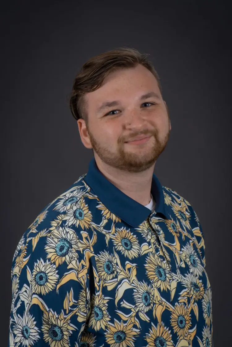 Professional portrait of USI psychology graduate Will Phillips '22