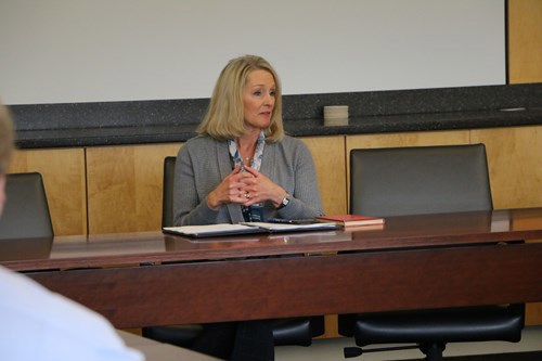Miller talks to students
