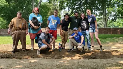 anthropology students at a dig