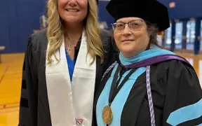 Charlotte Connerton with Graduate Nursing Grad