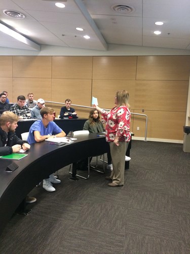 Yetter talking to class