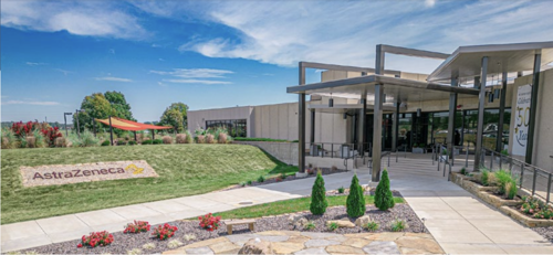 Outside the front of AstraZeneca's Mt. Vernon facility on a sunny day.