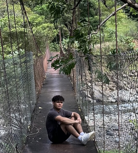 Geovany Castillo sitting on a bridge outside
