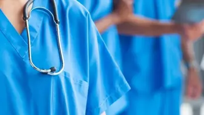 photo of people wearing bright blue scrubs