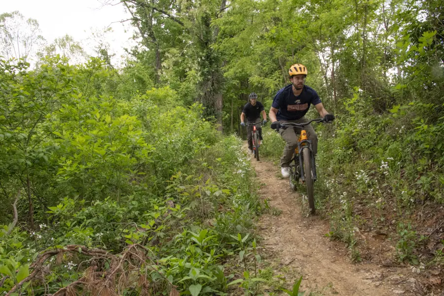 Members of the Evansville community enjoy the many mountain bike trails on campus.
