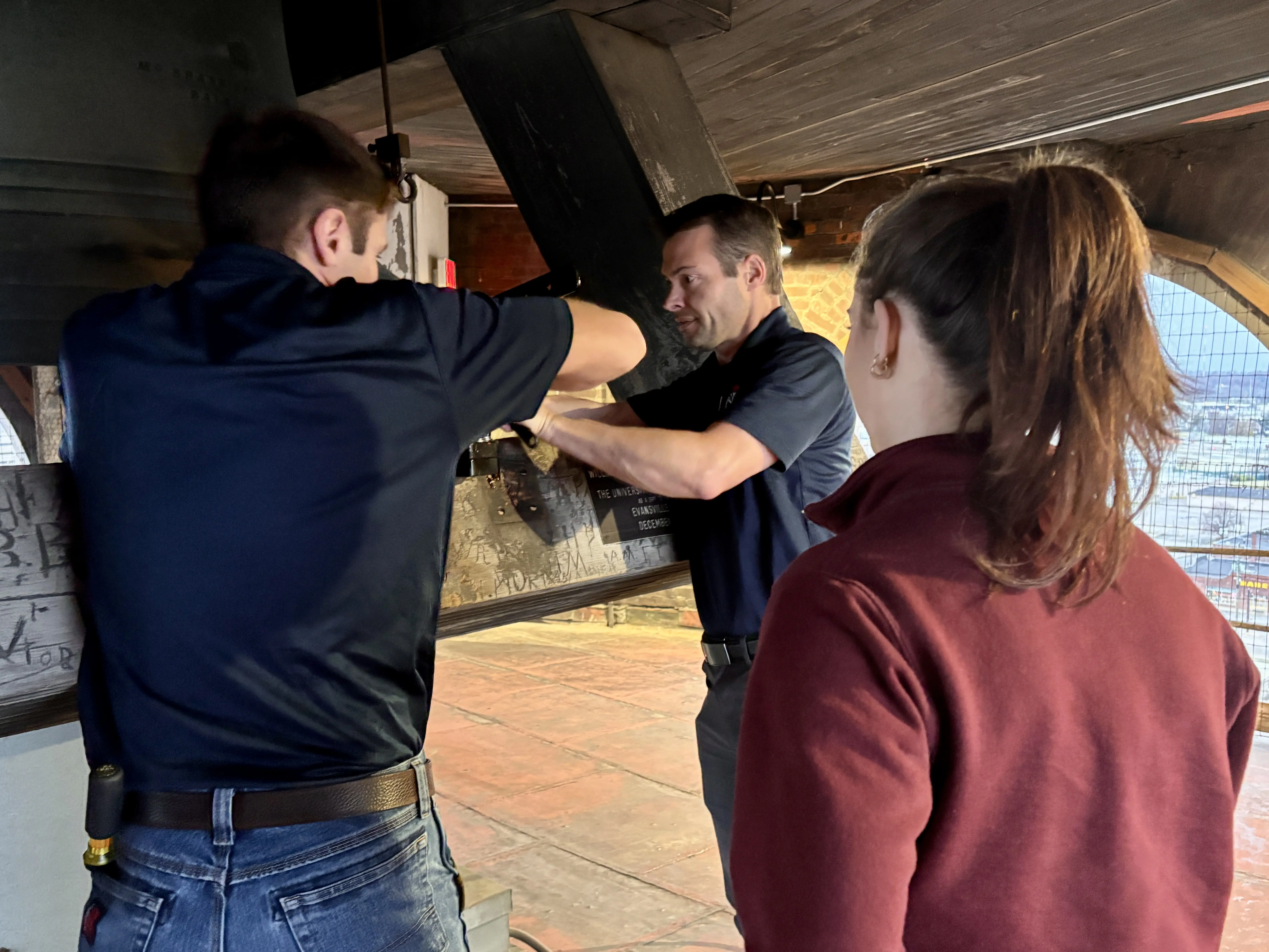 Center for Applied Research students working on bell mechanics in the Old Courthouse.