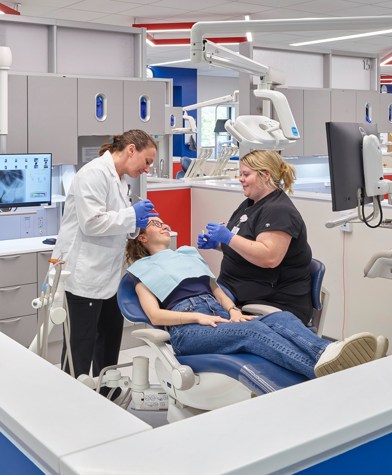 Dental hygiene closeup of patient in chair in clinic