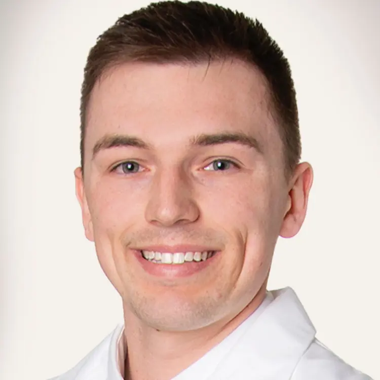 Professional portrait of USI pre-physician assistant alumnus Casey Branham