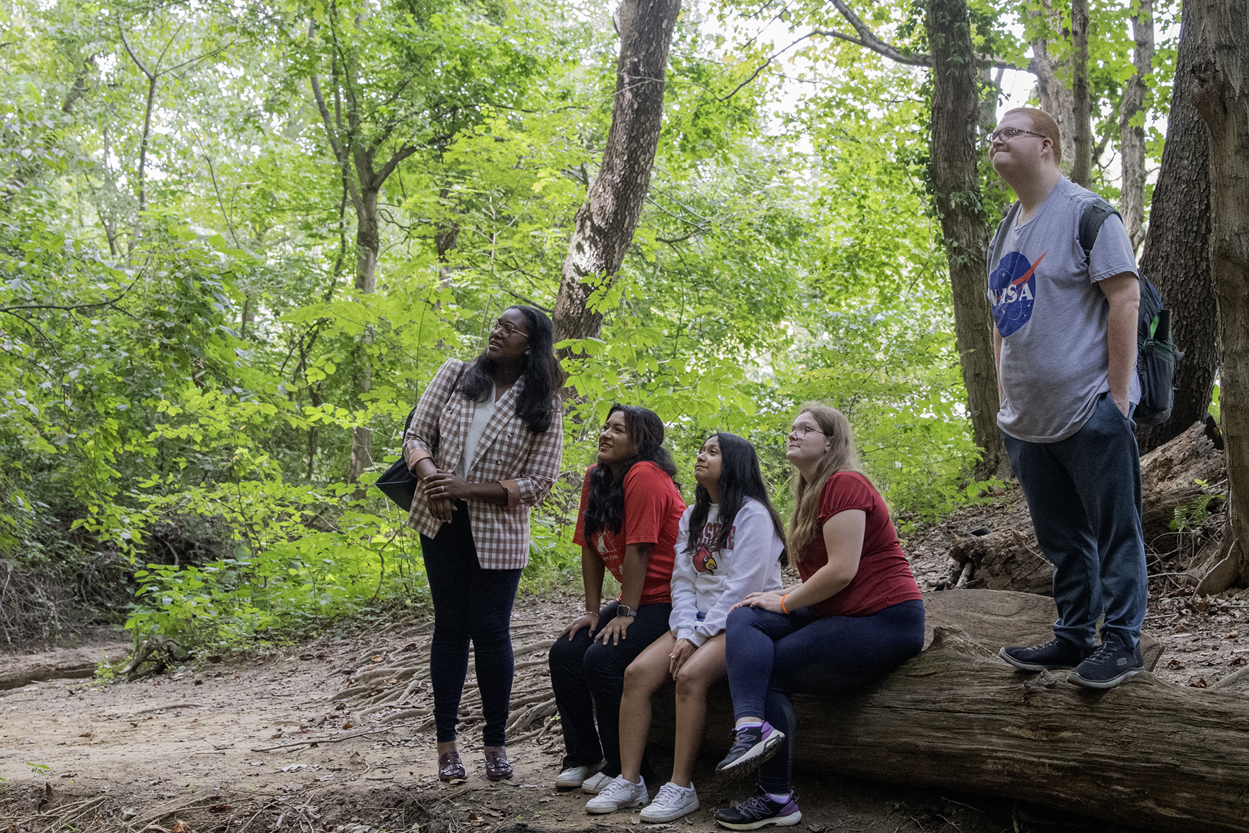 Students admire the sandstone cliffs on the south east end of the trails. 