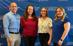 Photo with Tri-State Food Bank and Feed Evansville representatives with USI faculty