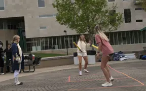Students practicing fencing.