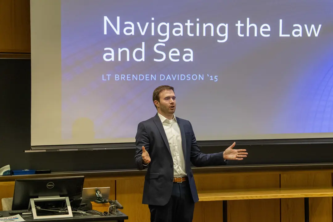 Lt. Brenden Davidson '15 gives his Alumni in Residence presentation, "Navigating the Law and Sea"