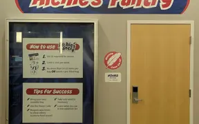 Photo of Entrance to Archie's Closet and Signage