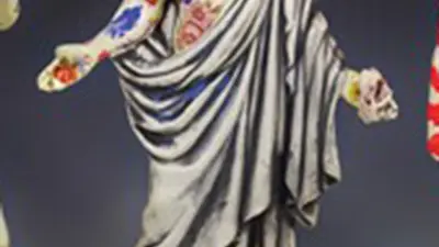 Three ceramic figures