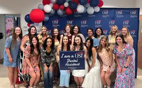 Students celebrate completing dental assisting program