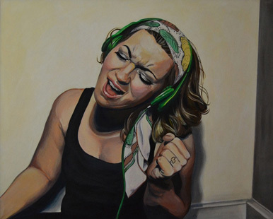 Woman singing with headphones on