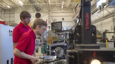 Students using equipment 
