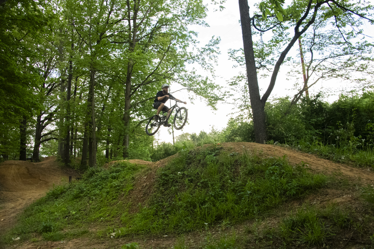Members of the Evansville community enjoy the flow trails on campus. 