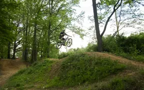 Members of the Evansville community enjoy the flow trails on campus. 