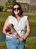 Jillian Gallagher with a bouquet of flowers