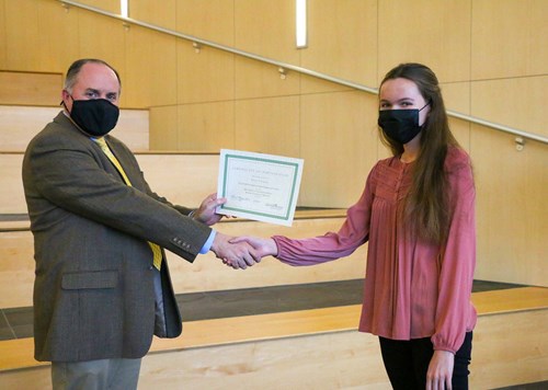 Thomas presenting certificate to Lisa