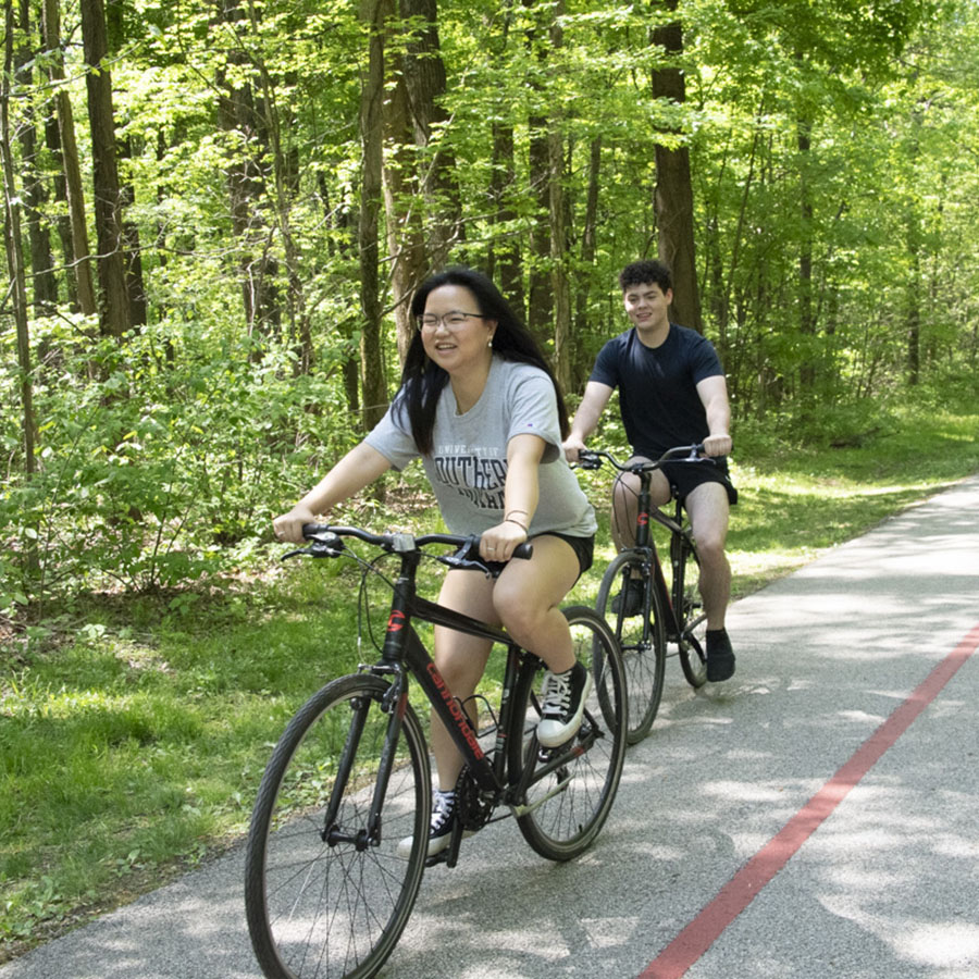 Students enjoy riding bikes on the Burdette Trails. USI's Recreation, Fitness and Wellness Center rents out bikes free to USI students. 