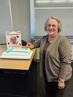Tina with graduation cake