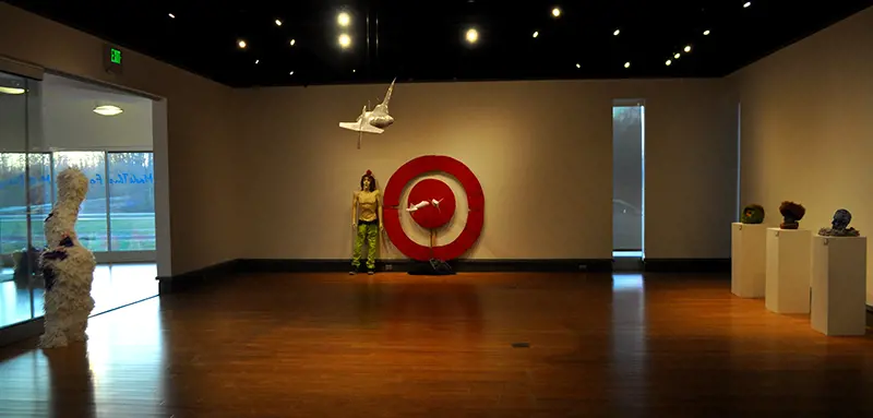 View of gallery with sculptures