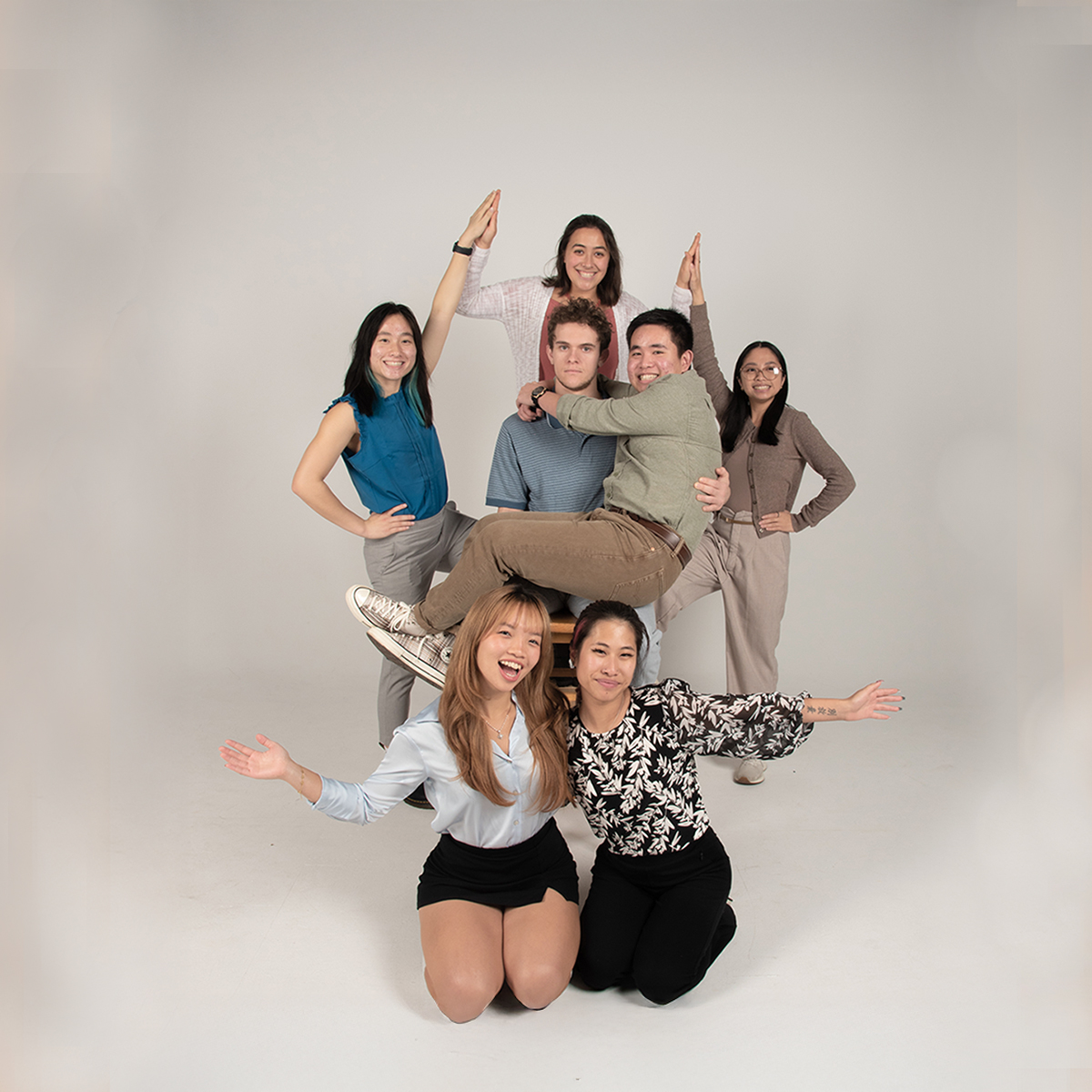 Members of the Asian Student Unions strike a fun pose in the photo studio.