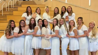 group of sorority girls posing in the Business and Engineering center Atrium